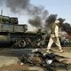 U.S. soldiers in Basra reconstruct Iraq, while you do nothing but criticize.